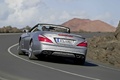 Mercedes SL63 AMG gris mate 3/4 arrière gauche travelling penché