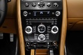 Aston Martin DBS Carbon Edition orange console centrale debout