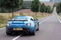 Aston Martin V12 Zagato bleu 3/4 arrière droit travelling