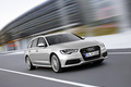 Audi A6 Avant 3.0 TFSI gris 3/4 avant droit travelling penché 2