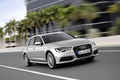 Audi A6 Avant 3.0 TFSI gris 3/4 avant droit travelling penché 3