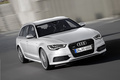 Audi A6 Avant 3.0 TFSI gris 3/4 avant droit travelling penché