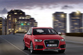 Audi RS Q3 rouge 3/4 avant droit travelling 2