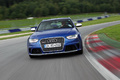 Audi RS4 bleu face avant travelling penché