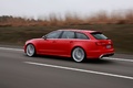 Audi RS6 Avant rouge 3/4 arrière gauche travelling 2