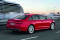 Audi S6 V8 rouge 3/4 arrière droit travelling