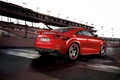 Audi TT RS Plus - Rouge - 3/4 arrière droit, dynamique