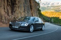 Bentley Continental Flying Spur II marron 3/4 avant gauche travelling penché