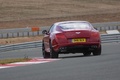 Bentley Continental GT V8 rouge face arrière penché