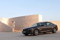 BMW 750Li MY2012 marron 3/4 avant gauche