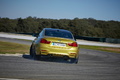 BMW M4 2014 - jaune - 3/4 arrière gauche burn