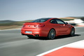 BMW M6 2015 - Orange - 3/4 arrière droit dynamique