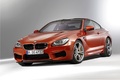 BMW M6 Coupé - orange - 3/4 avant gauche