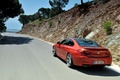 BMW M6 orange 3/4 arrière gauche travelling