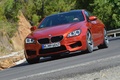 BMW M6 orange 3/4 avant gauche penché 2