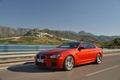 BMW M6 orange 3/4 avant gauche travelling