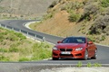 BMW M6 orange 3/4 avant gauche