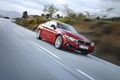 BMW Série 4 435i - rouge - 3/4 avant droit dynamique penché