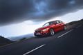 BMW Série 4 435i - rouge - 3/4 avant gauche dynamique