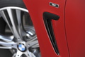BMW Série 4 435i - Rouge - détail, écopes ailes avant