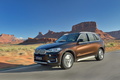 BMW X5 2013 - marron - 3/4 avant gauche, dynamique