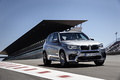 BMW X5M 2014 - Gris - 3/4 avant droit dynamique