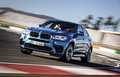 BMW X6 M - Bleu - 3/4 avant gauche dynamique