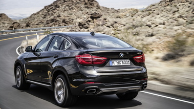 BMW X6 xDrive 50i 2014 - noir - 3/4 arrière gauche