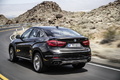 BMW X6 xDrive 50i 2014 - noir - 3/4 arrière gauche