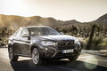 BMW X6 xDrive 50i 2014 - noir - 3/4 avant droit