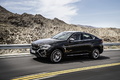 BMW X6 xDrive 50i 2014 - noir - 3/4 avant gauche