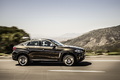 BMW X6 xDrive 50i 2014 - noir - profil droit dynamique