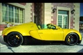 Bugatti Veyron Grand Sport - noire/jaune - profil droit