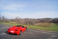 Ferrari 458 Spider rouge 3/4 arrière droit vue de haut