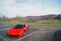 Ferrari 458 Spider rouge 3/4 avant gauche vue de haut