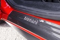 Ferrari 458 Spider rouge pas de porte