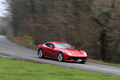 Ferrari F12 Berlinetta rouge 3/4 avant droit filé