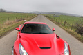 Ferrari F12 Berlinetta rouge face avant debout