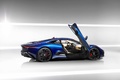 Jaguar C-X75 bleu profil porte ouverte