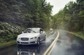 Jaguar XF AWD blanc 3/4 avant gauche travelling