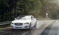 Jaguar XJ AWD blanc 3/4 avant gauche travelling