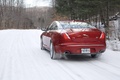 Jaguar XJ V6 AWD rouge 3/4 arrière gauche travelling