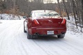 Jaguar XJ V6 AWD rouge face arrière travelling