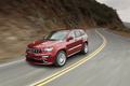 Jeep Grand Cherokee SRT-8 rouge 3/4 avant gauche travelling 