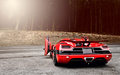 Koenigsegg Agera R rouge face arrière portes ouvertes