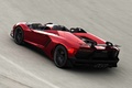 Lamborghini Aventador J rouge 3/4 arrière gauche travelling vue de haut penché