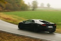Lamborghini Aventador noir 3/4 arrière gauche filé penché 2