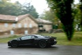 Lamborghini Aventador noir 3/4 arrière gauche filé