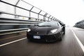 Lamborghini Aventador noir 3/4 avant gauche travelling