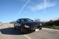 Maserati Quattroporte MY2013 marron 3/4 avant droit travelling penché